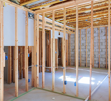 The inside of a basement apartment being built