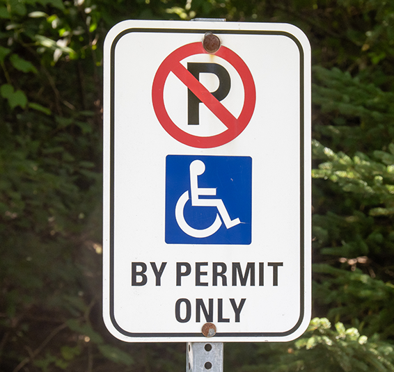 Accessible parking spot sign